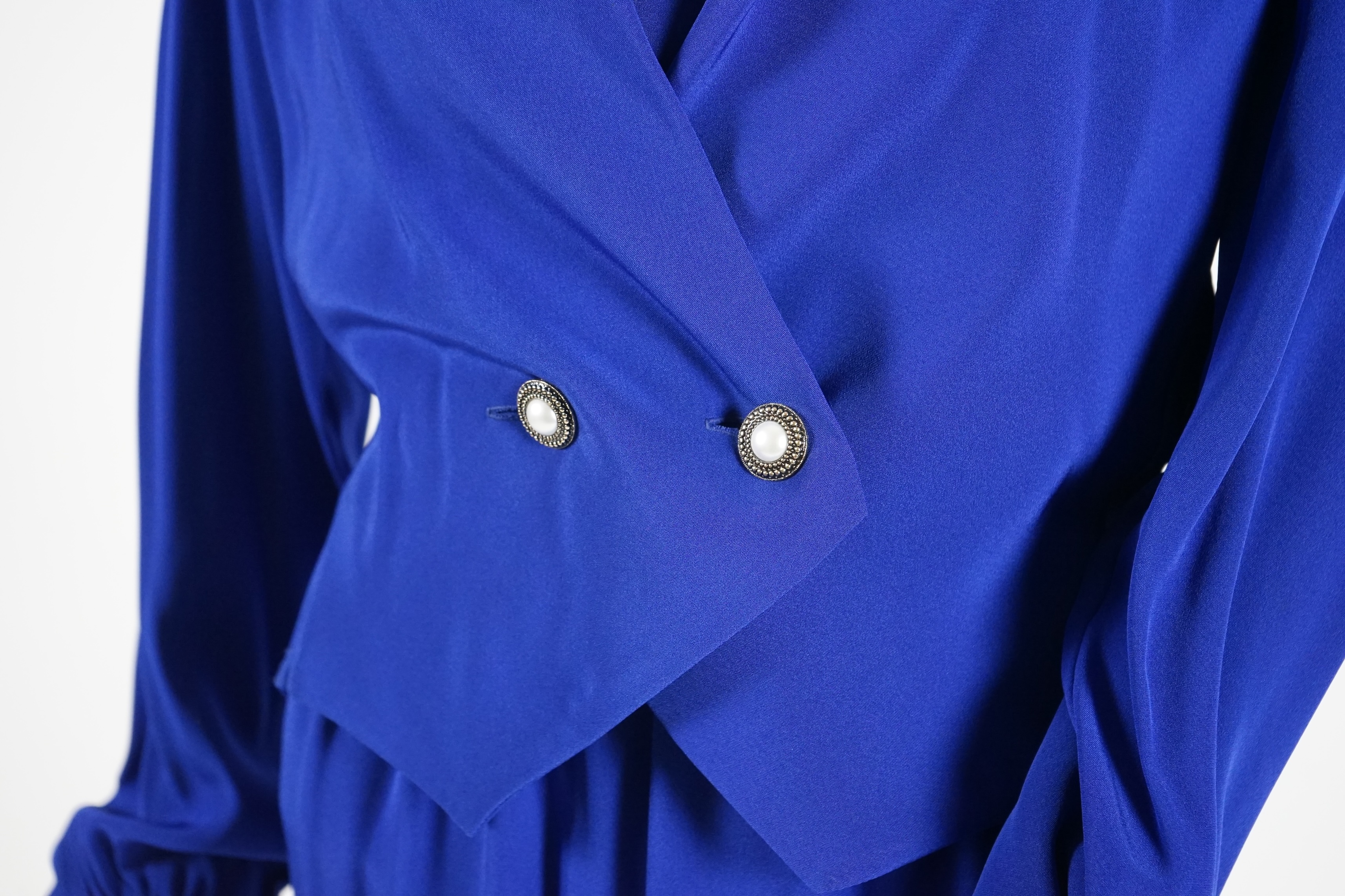 A matching Pallant silk skirt and blouse, a royal blue dress and matching bolero style jacket and black straight skirt and cream jacket. Approx sizes 8-12 Proceeds to Happy Paws Puppy Rescue